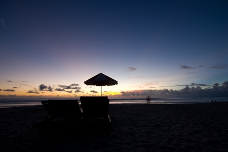 Silhuette and sun set at the sea の写真素材
