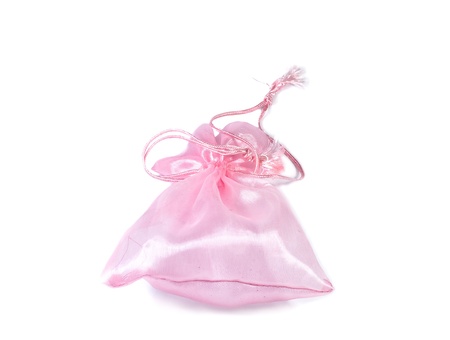 fabric pink bag isolated on white backgroundの写真素材