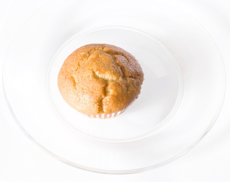 cup cake in white disk on white  backgroundの写真素材