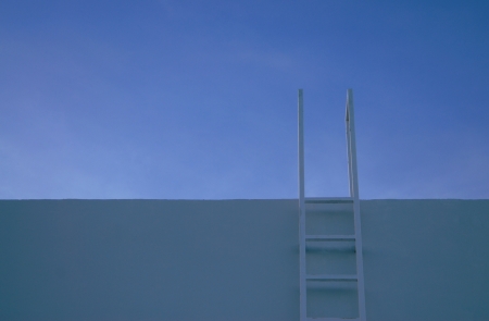 steel stair up to blue sky の写真素材