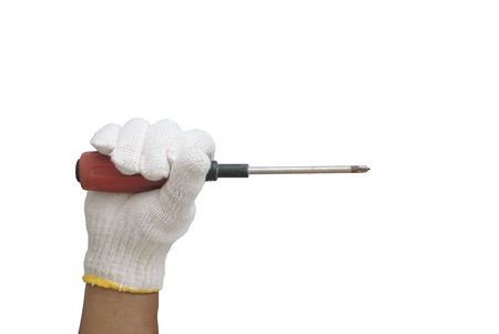 screwdriver in hand with cotton glove on white backgroundの写真素材