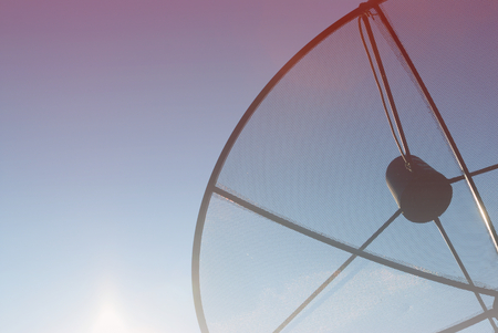 satellite dish antenna on sky backgroundの写真素材