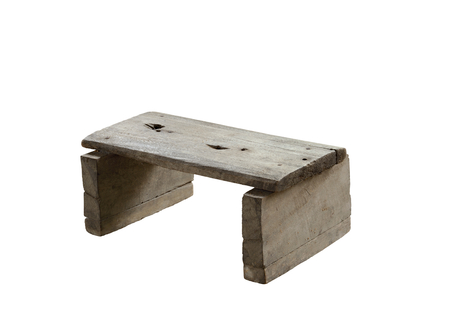 Old wooden small bench isolated on white background.の写真素材