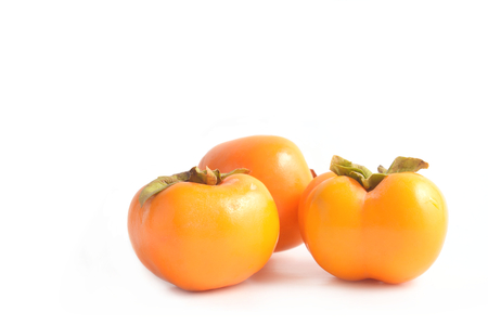 Persimmon fruit isolated on white background.の写真素材
