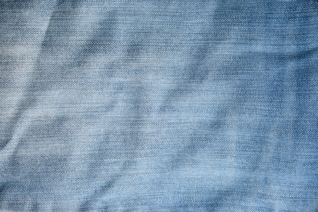 Blue jeans texture closeup for background. Denim background