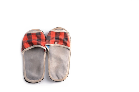 Old  house slippers on white background.の写真素材