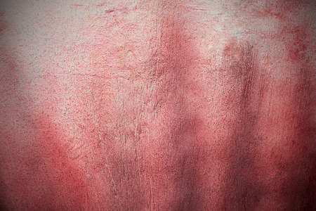 Cement wall texture with red paint.の写真素材
