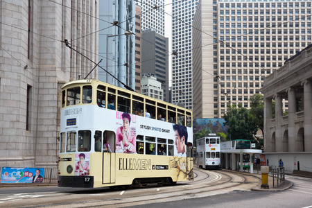 HONG KONG - MARCH 27: Double-decker trams. Trams also a major tourist attraction and one of the most environmentally friendly ways of travelling in Hong Kong on March 27, 2015 in Hong Kongのeditorial素材