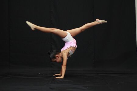 Girls playing gymnasticsの写真素材