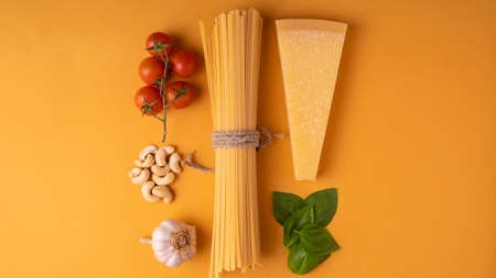 Pasta pesto. ingredients for Green vegetarian sauce pesto with basil, parmesan, nuts and olive oil....