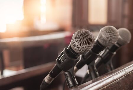 Three microphones were inside the church for the sermon of a Christian pastor.の写真素材