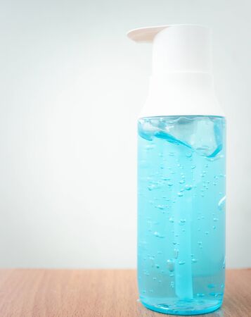 Alcohol gel in bottles for killing the Covid virus 2019. Concept for protecting yourself from germs.の写真素材