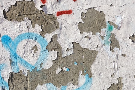 Texture of old stucco wall. Dumps paint and plaster. Bright sunlightの写真素材