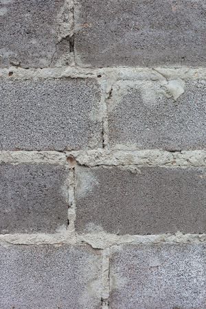 The texture of the walls of cinder block. Rough stitchesの写真素材