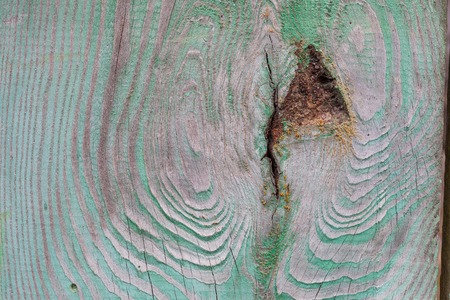 Texture of old wooden planks covered with paint. Paint exfoliatedの写真素材