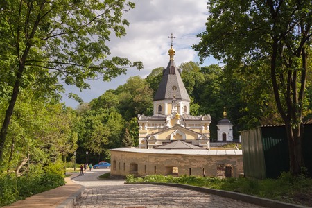 Church Life-giving Spring in the Kyiv-Pechersk Lavra. Summer sunny day. Green leaves on treesの写真素材
