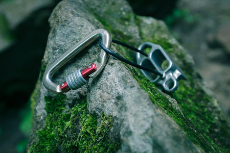 On the granite stone is a device for climbing insurance.の写真素材