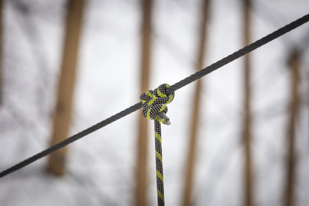 Rope park in the city. Knot and connection of insurance closeupの写真素材