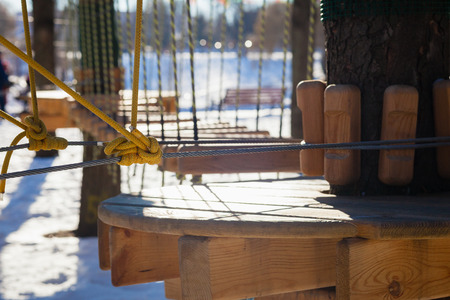 Knots and rope construction. Rope park in the city.の写真素材