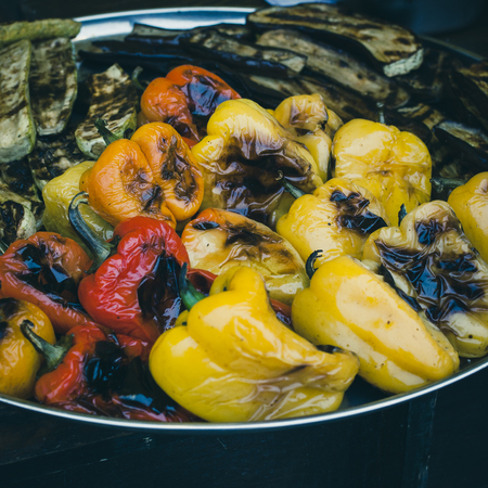 Freshly cooked grilled vegetables. Pepper, zucchini, eggplant.
Street sale of vegetables baked on the grill at the celebrationの写真素材