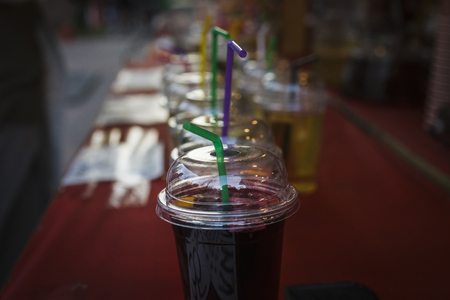 Lemonade, a refreshing drink in a plastic cup. Street foodの写真素材