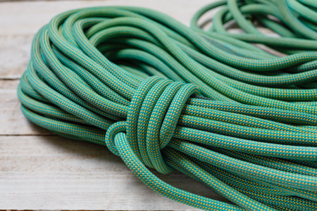 Bayed rope for climbing. Green rope for mountaineering close up. nodeの写真素材