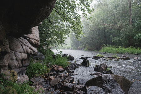 Climbing area Buksky canyon, rain on the Gorsky Tikich river near high granite rocks, Cherkasy region. Sights and nature of Ukraine.の写真素材