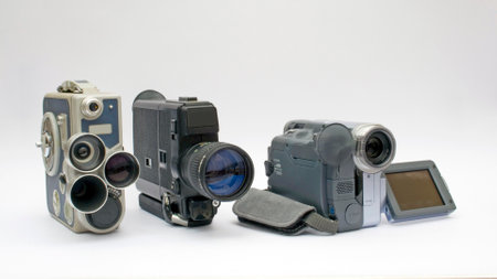 Three generations of cameras isolated on the white backgroundの写真素材