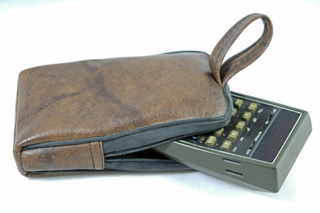 Vintage scientific digital calculator isolated on the white backgroundの写真素材