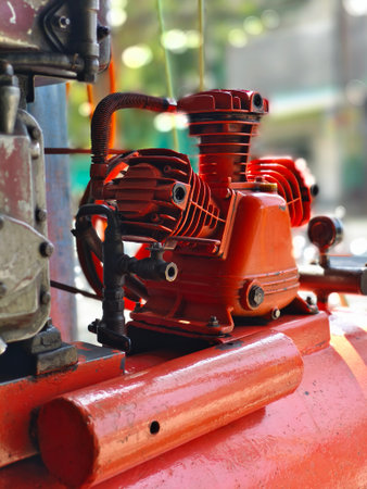 Air compressor machine, close up pulley cover and belt drive. A machine consisting of a pulley and belt.Air compressor machine for patching punctured tiresの写真素材