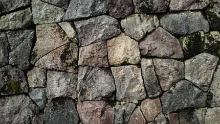Stack of neatly arranged rocks, textured stone background, Texture of a stone wall. Stone background.の写真素材