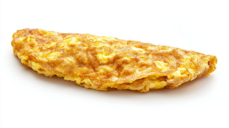 A scrumptious omelet featuring a fluffy and golden texture, perfect for breakfast or brunch. Ideal for culinary photography highlighting delicious meals.の素材