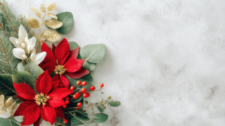 A beautiful holiday floral arrangement featuring vibrant red poinsettias, lush greenery, and eucalyptus set against a soft textured background, celebrating the season.の素材