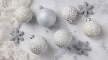 This beautiful arrangement features white and silver Christmas ornaments with intricate snowflake patterns, perfect for holiday decorations and festive atmospheres.の素材