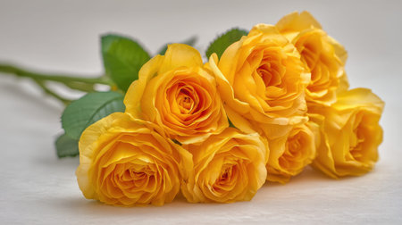 This elegant bouquet features vibrant yellow roses with lush green leaves, perfect for enhancing any floral theme or adding a touch of warmth to your visuals.の素材