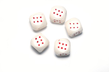 5 white dice with red on white backgroundの写真素材