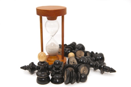 chess figures and sand-glass