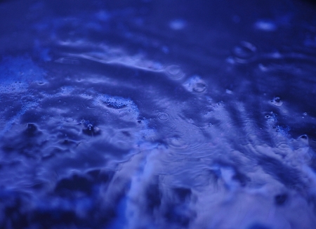 Dark blue boiling waterの写真素材