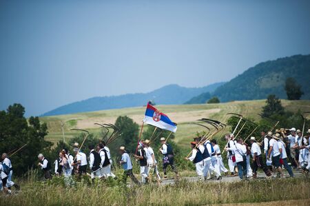 RAJAC, SERBIA - JULY 19, 2015: Mowing on Rajac mountain, traditional competiton in Central Serbia,...