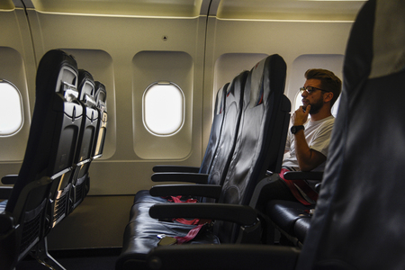 BELGRADE, SERBIA - 1 JUNE 2019: Almost empty salon of serbian AirSerbia airplane on first flight on Belgrade - Venice lineのeditorial素材