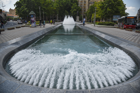 BELGRADE, SERBIA - JUNE 24, 2019:  NIkola Pasica square in front of Union hall where statue of NIkola Pasic and beautiful famous fountain is placedのeditorial素材