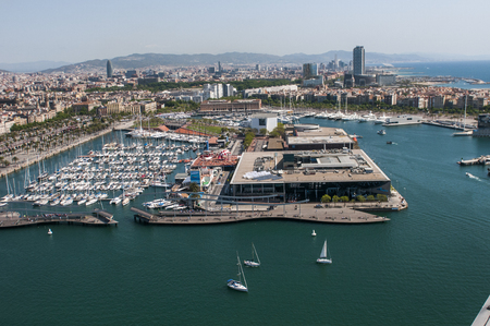 BARCELONA, SPAIN - 9 MAY 2019: Aerial view of Barcelona from the cableway to the Montjuic hill with the Barceloneta beach and Port Vell. Catalonia, Spain, Europeのeditorial素材