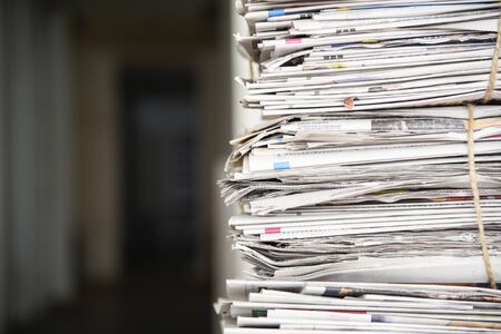 Lots of retro journals with headlines, articles and photosの写真素材