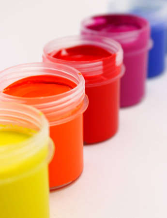 Colorful paint cans on a white background.の写真素材