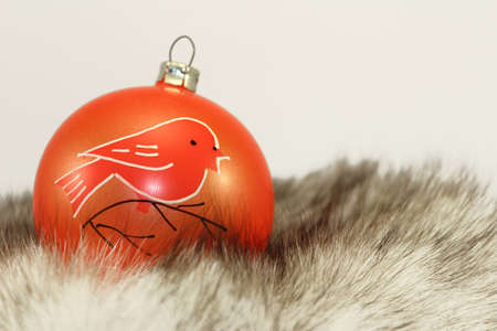 Orange Christmas Bauble on Fur.の写真素材