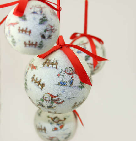 Christmas Baubles with Red Ribbonons on White Background.の写真素材