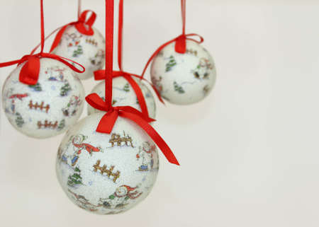 Christmas Baubles with Red Ribbonons on White Background.の写真素材