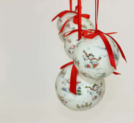 Christmas Baubles with Red Ribbonons on White Background.の写真素材