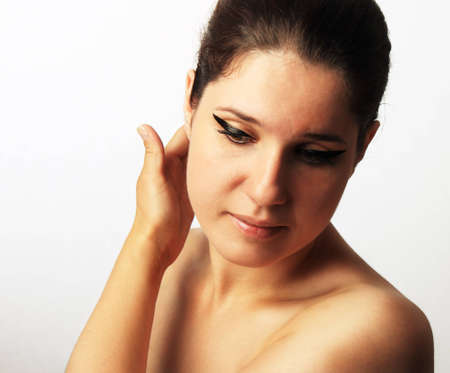 Young beautiful woman with eye make-upの写真素材