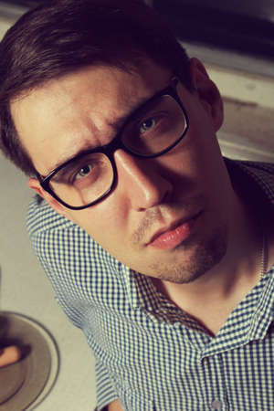 Funny young man wearing glassesの写真素材